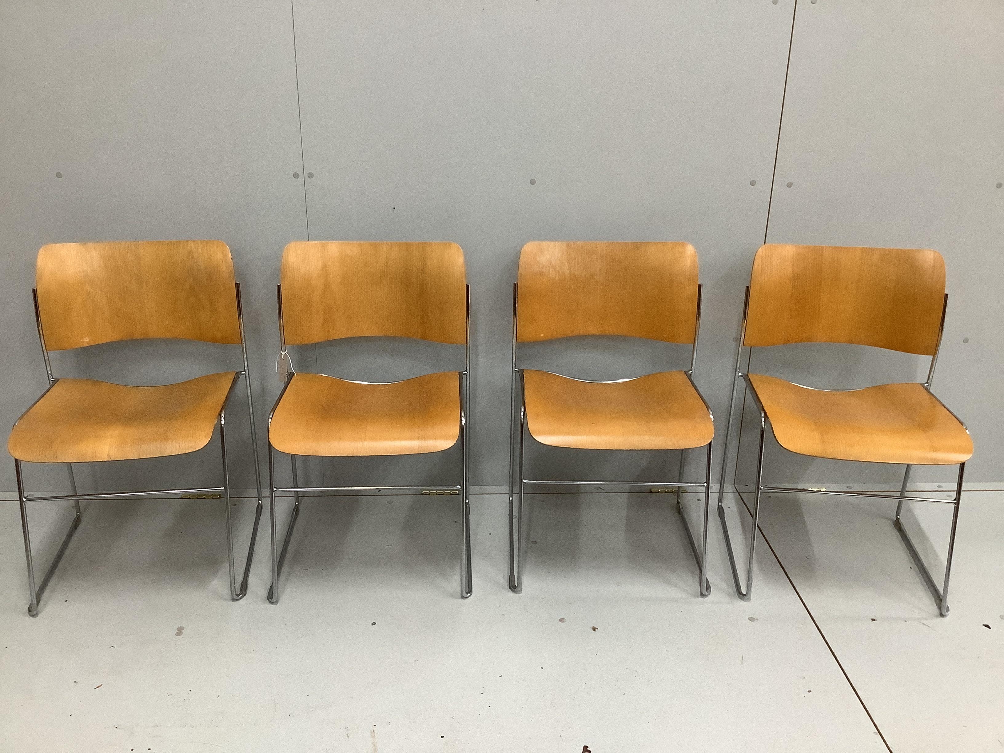 Four mid century 'Howe' bent ply and chrome stacking chairs